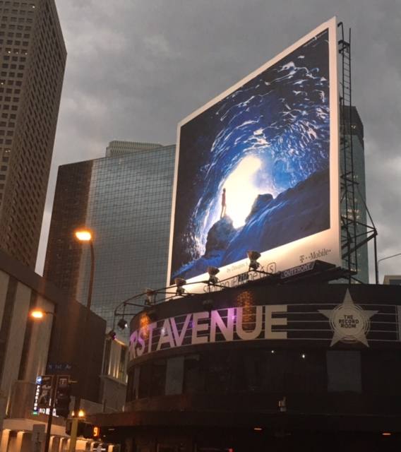 The photograph on a billboard above First Avenue