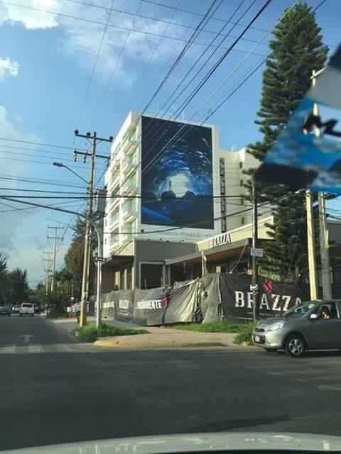The photograph wrapped around a building in Mexico