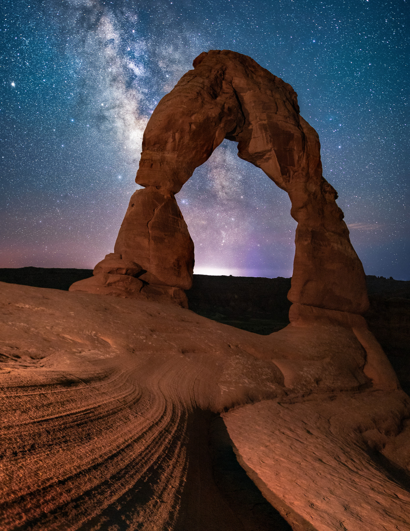 Delicate Arch at Night shown in a living room